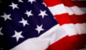 Blurred image of the American flag.