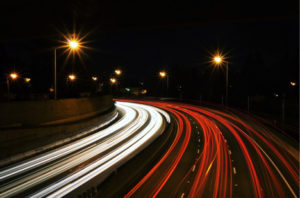 Highway light trails at night, long exposure.